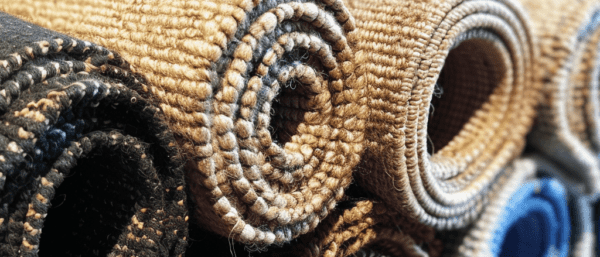 Rolls of stacked carpets